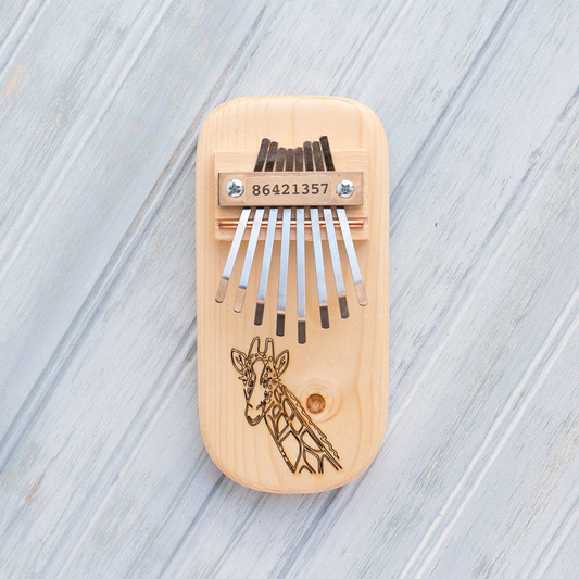 Giraffe Engraved Thumb Piano